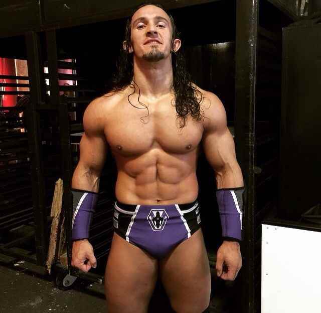 Wrestler Neville (Ben  Satterly)