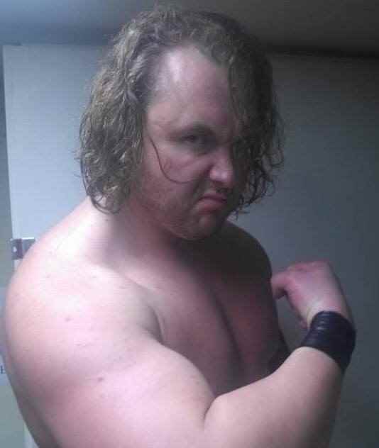 Wrestler Adam Knight (Jeff  Doyle)
